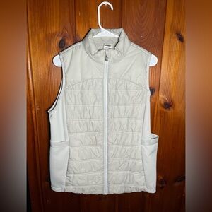 Extra large white/grey vest. In nice condition is lightly worn.